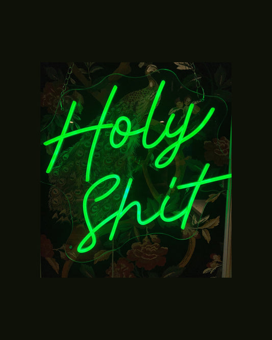 Louez notre enseigne néon 'Holy Shit'